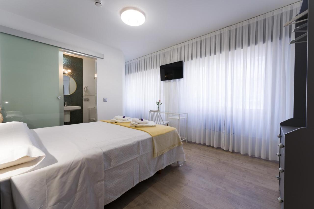 Pension Ferradura Melide Bagian luar foto
