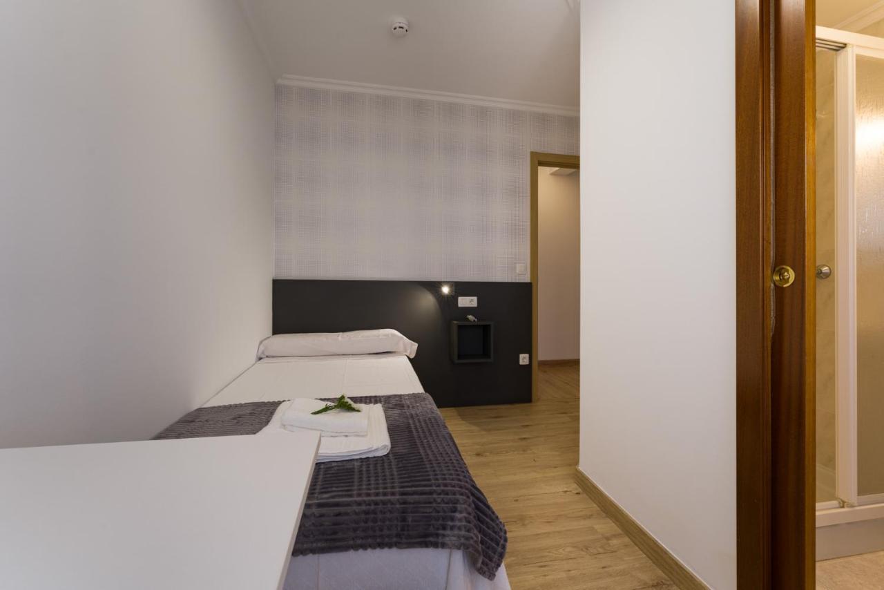 Pension Ferradura Melide Bagian luar foto